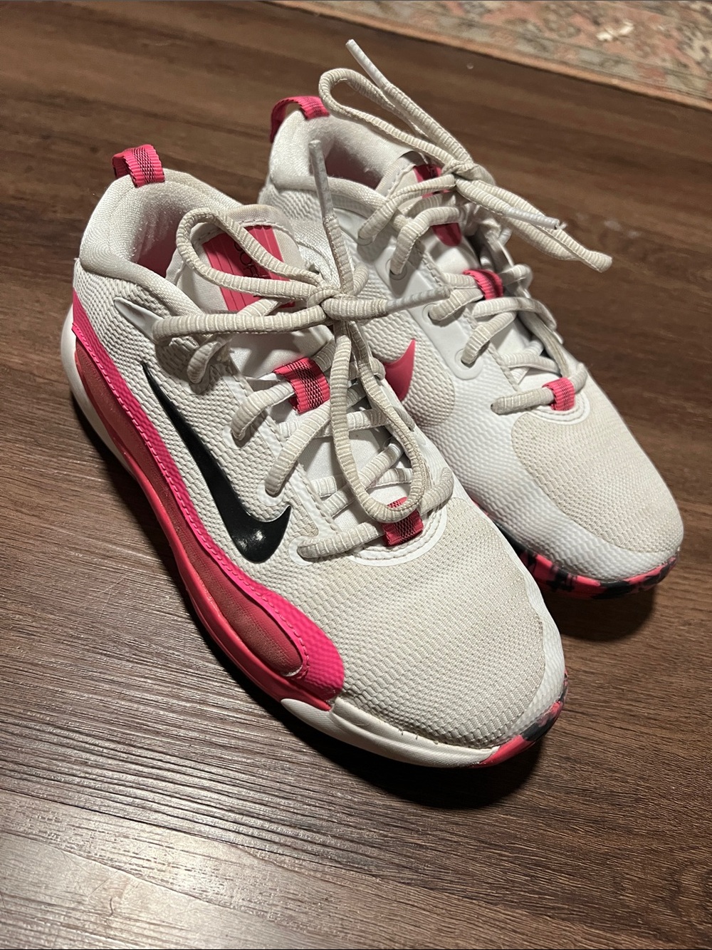 Nike basketball youth shoes. White and hot pink size 3